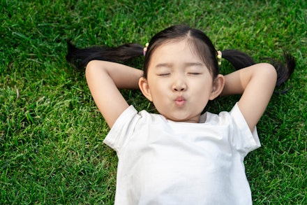 girl with eyes closed