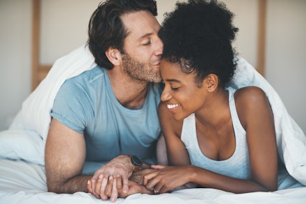 happy couple in bed