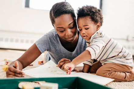 Mother and son reading together