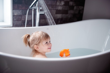 small girl in bath