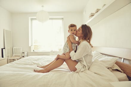 1) Harness your hormones Mum kissing baby