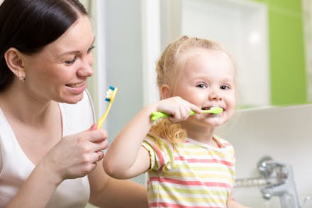 1) Play copycat mum and toddler brushing their teeth together