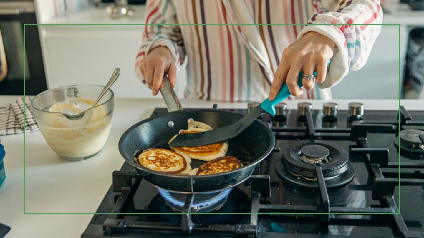 https://images.bauerhosting.com/affiliates/sites/10/2022/07/Woman-using-frying-pan-make-pancakes-getty.jpg?ar=16%3A9&fit=crop&crop=top&auto=format&w=1440&q=80