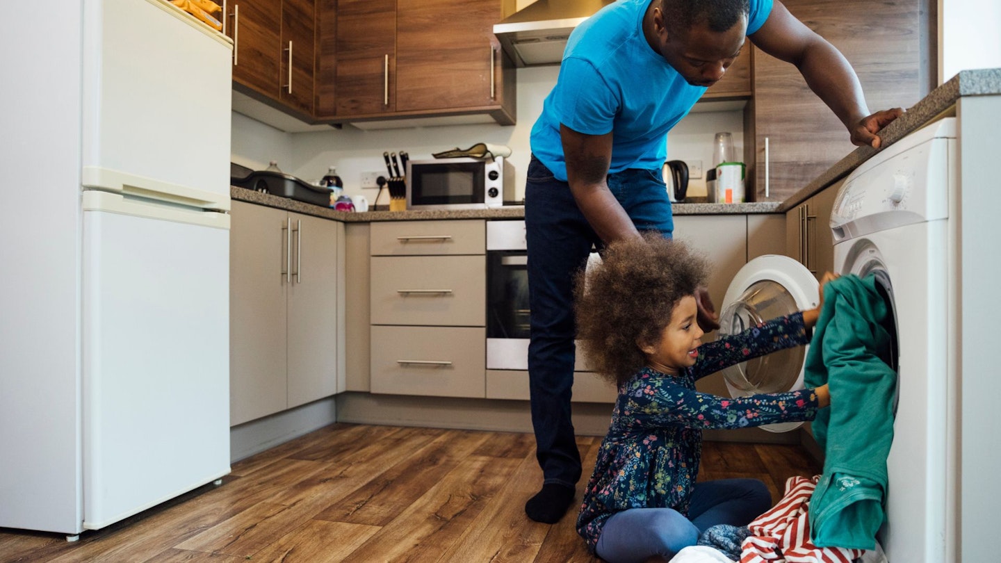 Family using washing machine