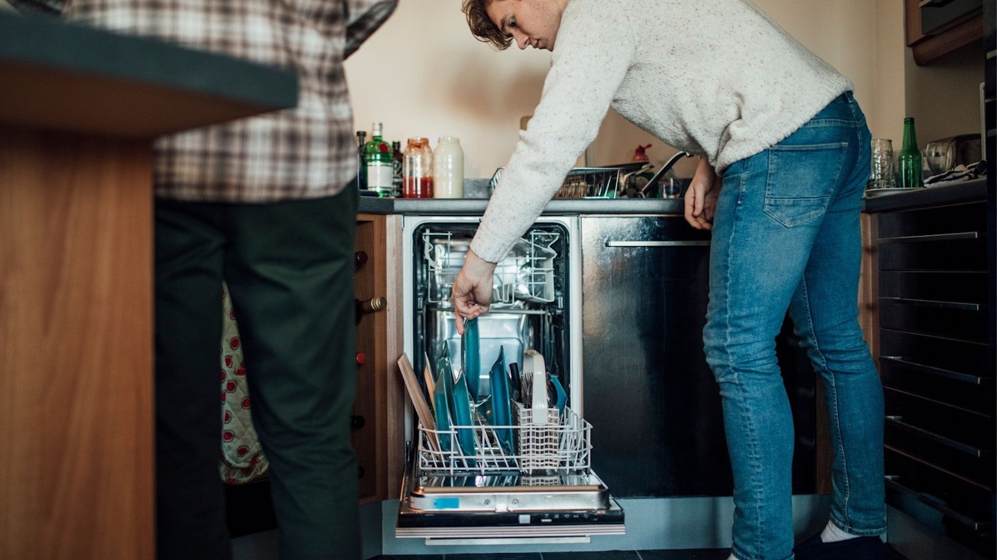 Men using slimline dishwasher