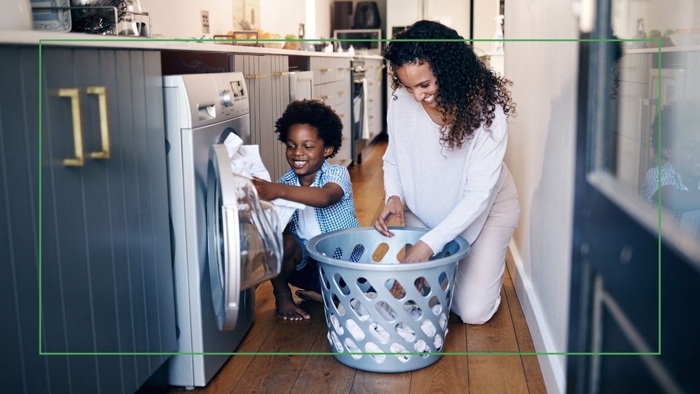 family using combined washer dryer
