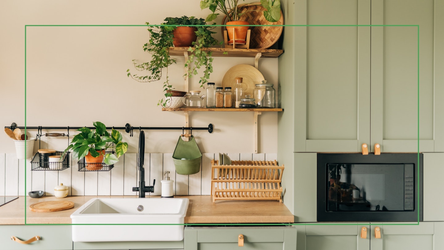 Stylish interior of a green, modern kitchen