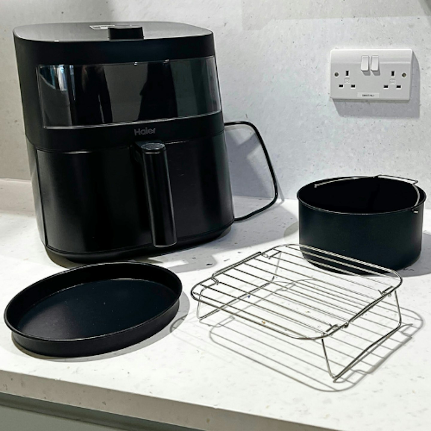 Haier Multi Air Fryer accessories on a countertop