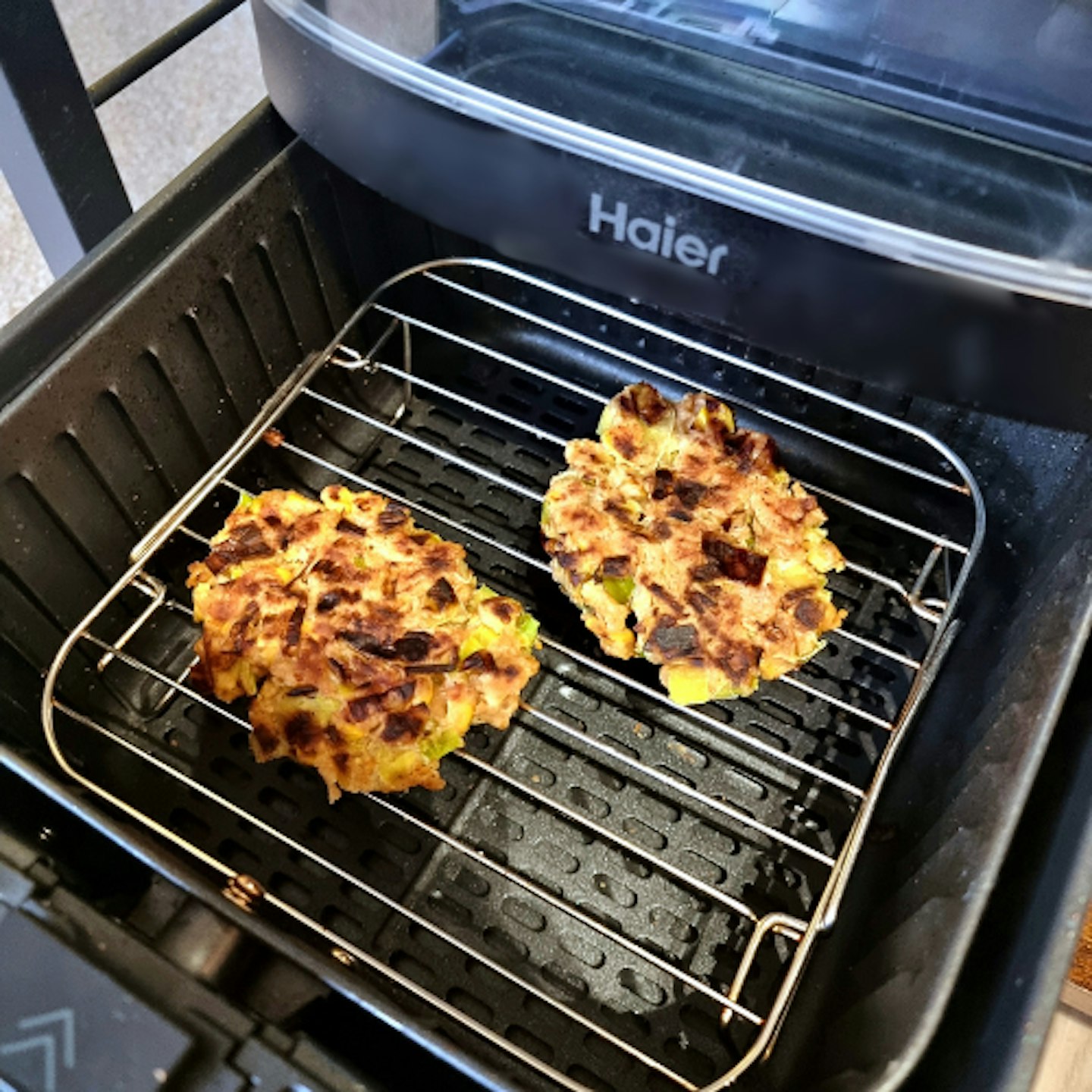 Haier Multi Air Fryer cooking sweetcorn fritters using the grill tray