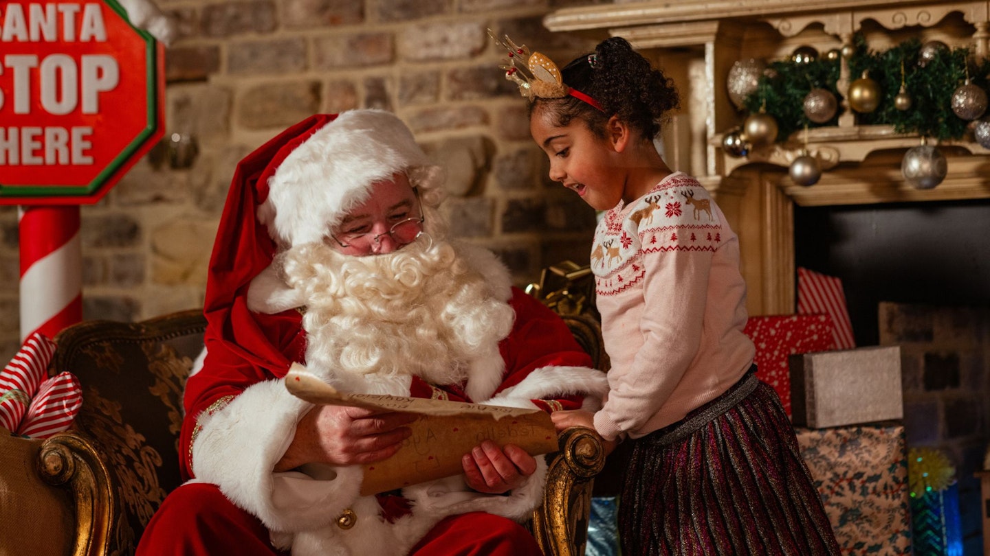 child meeting Santa Claus