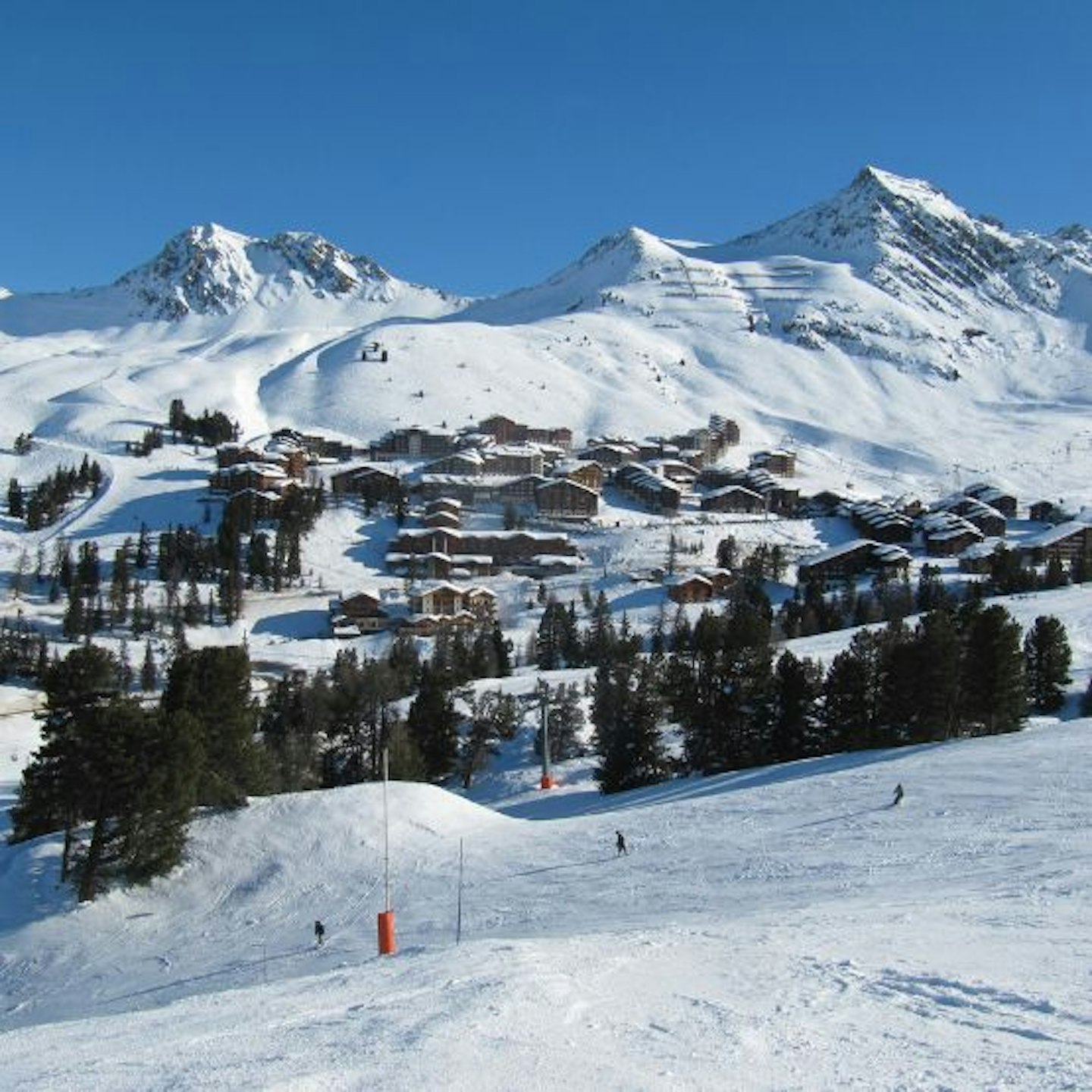 Ski slopes and a ski resort in front