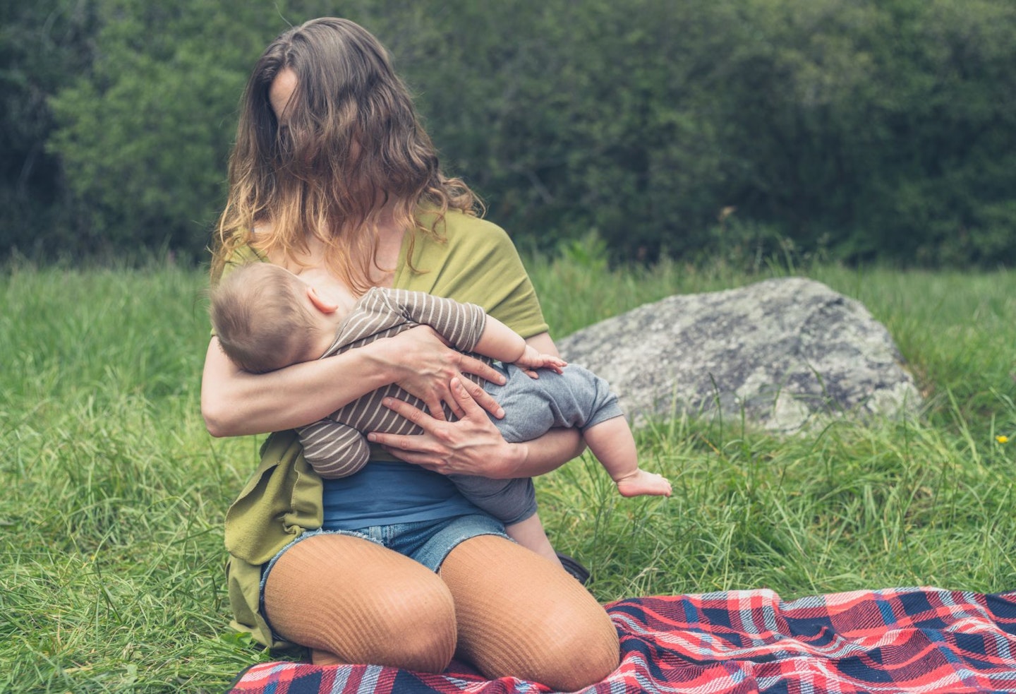 Mother breastfeeding her baby