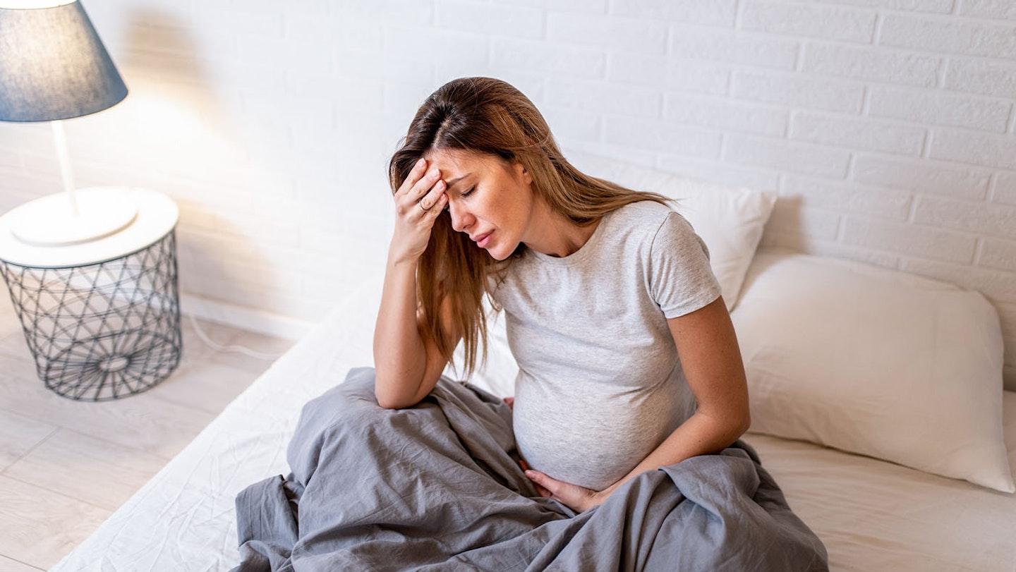 15 weeks pregnant symptoms