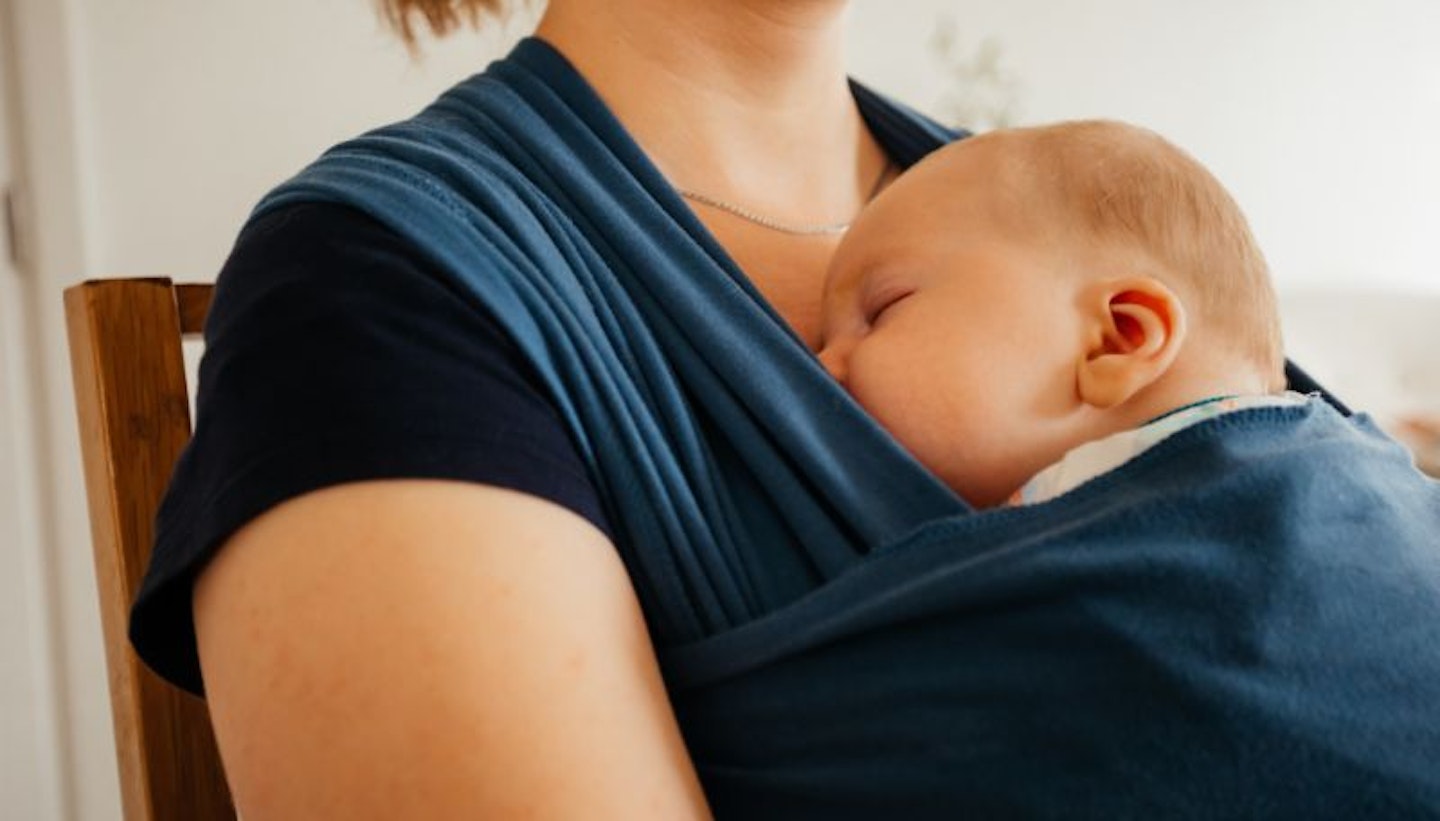 image of a mum with newborn baby in blue sling