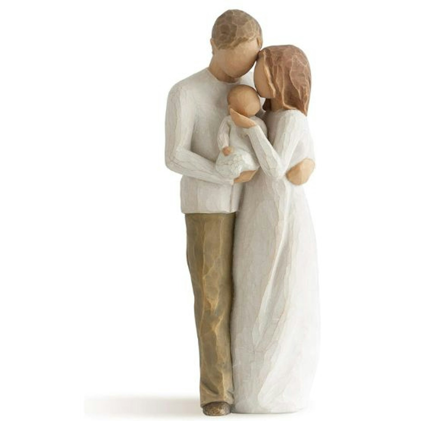 A figurine of a man and a woman holding a baby