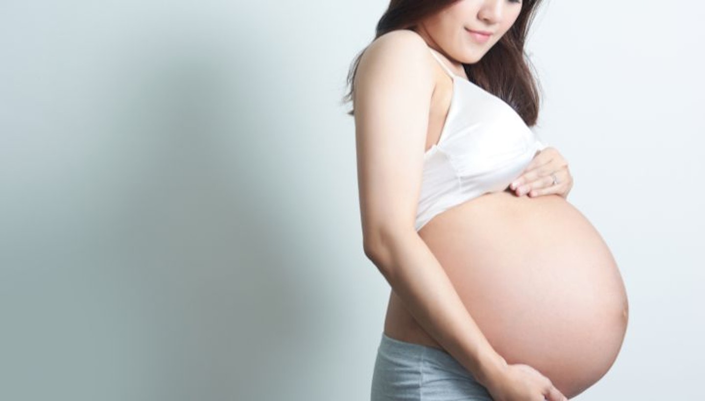 Smile woman Pregnant in nine months waiting for her baby