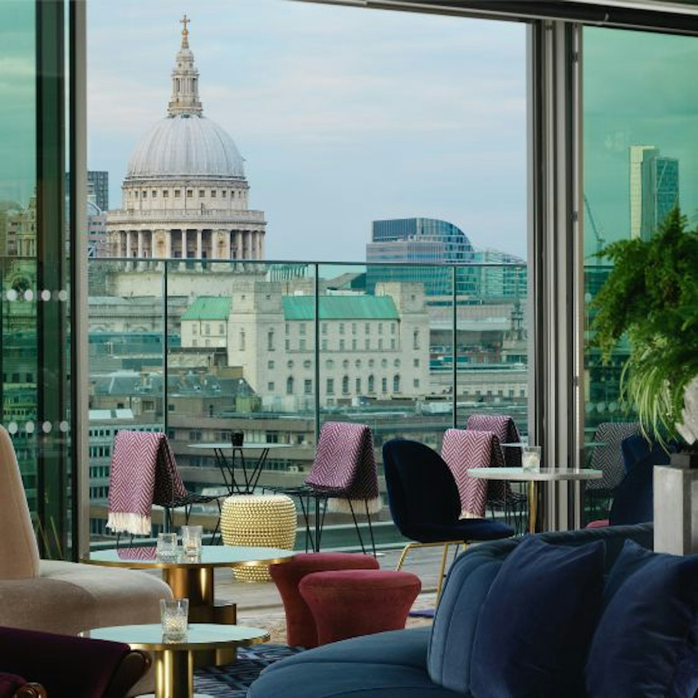 A view of London and St Pauls Cathedral seen through a restaurant at Sea Containers Hotel London 