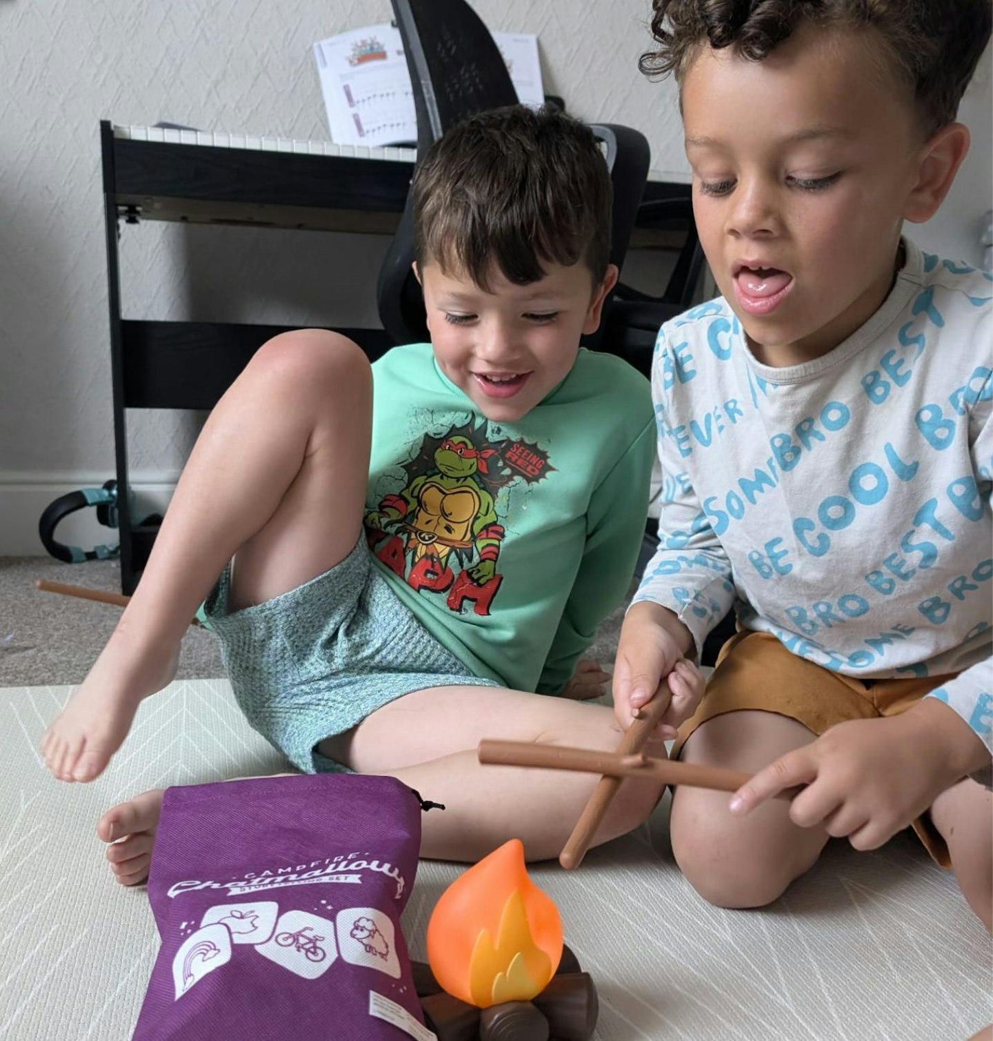 George and Frank James playing Chatmallows Story Telling Set