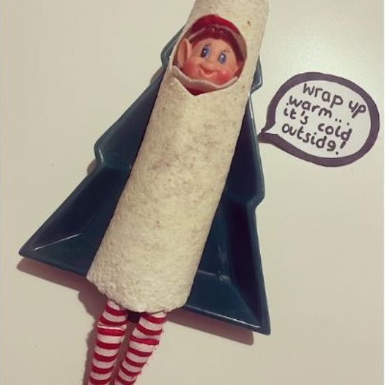 An elf wrapped up in a tortilla wrap