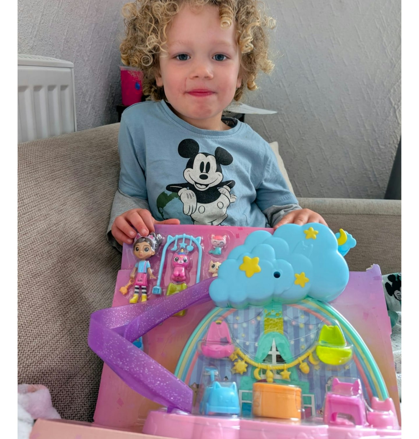 Little boy playing with Kitty Care Ear Purrfect Playroom
