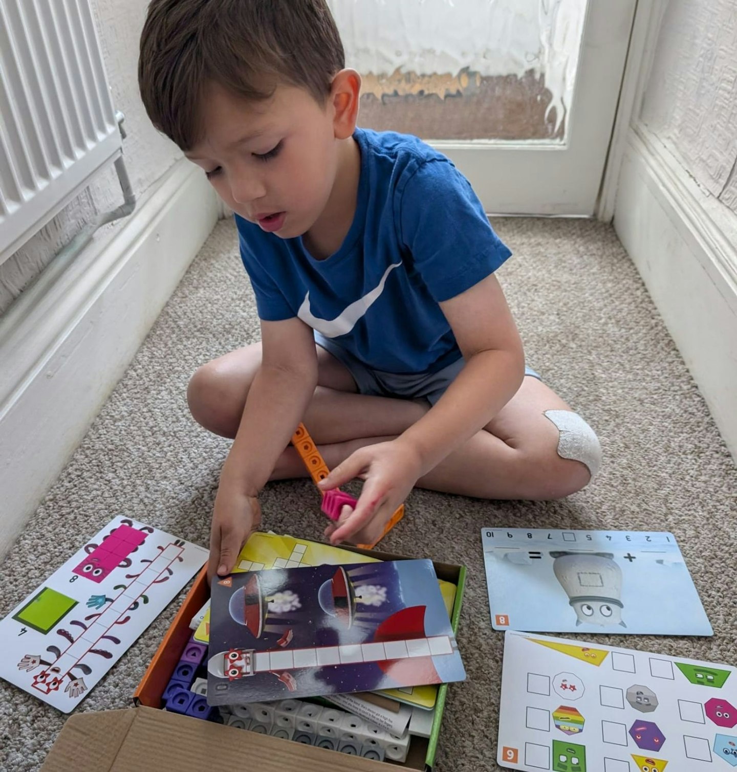 Five-year-old Frank testing the MathLink Cubes Numberblocks