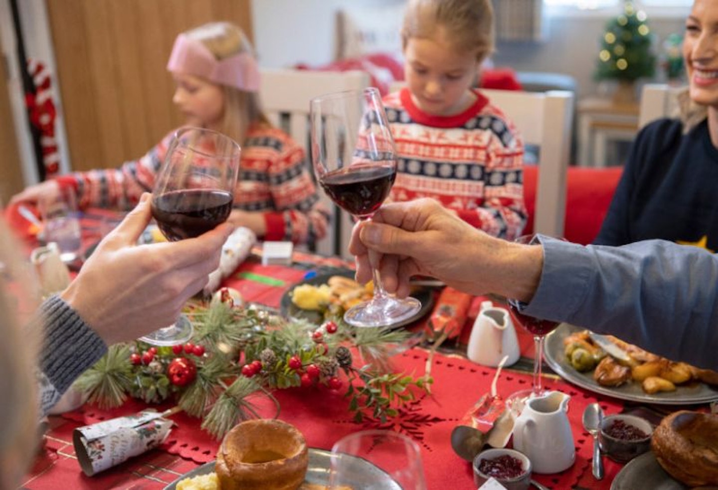 A family having Christmas lunch in a Parkdean resort caravan