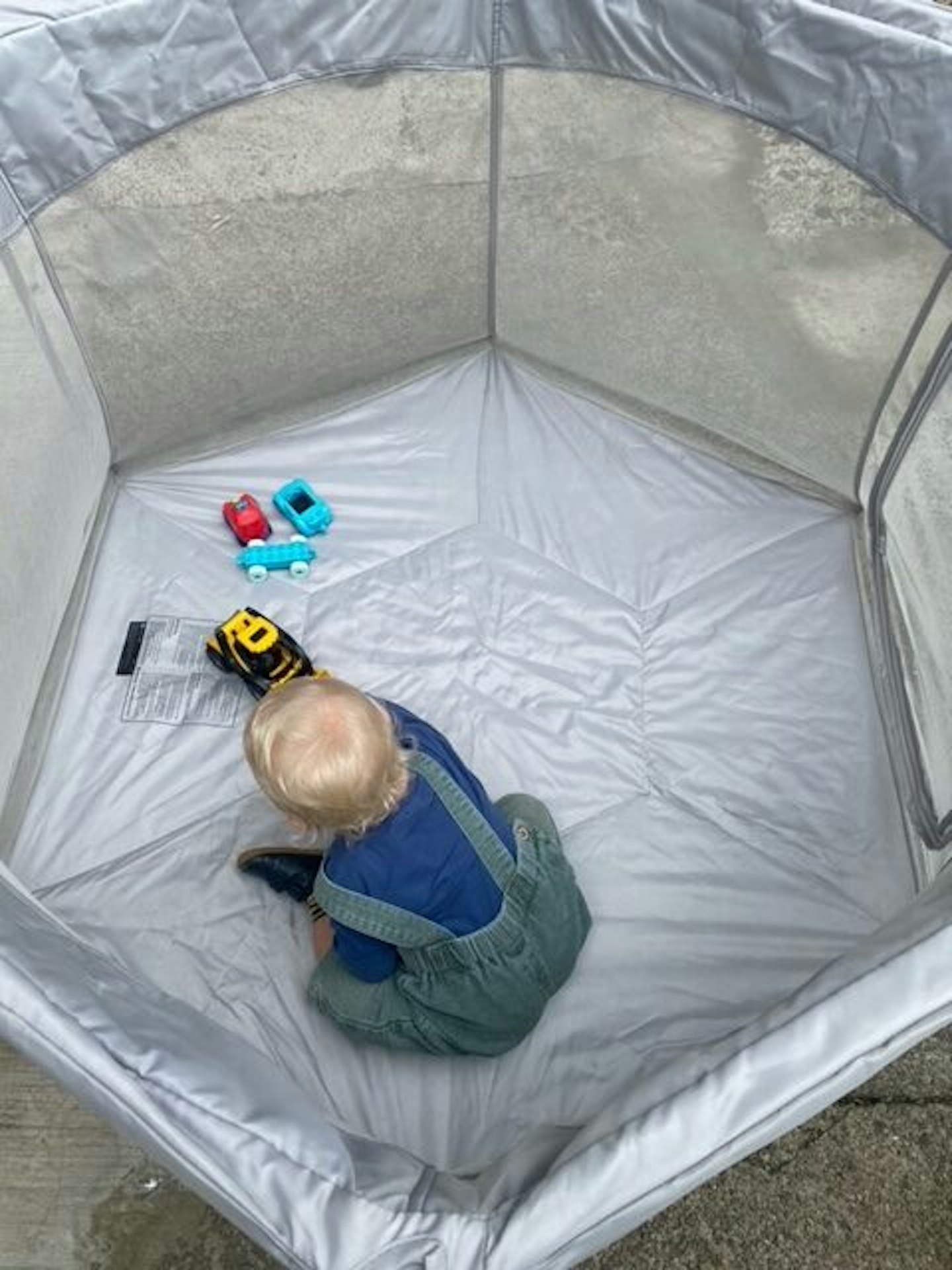 VENTURE-All-Stars-JOY-Playpen in use outdoors with a baby playing inside