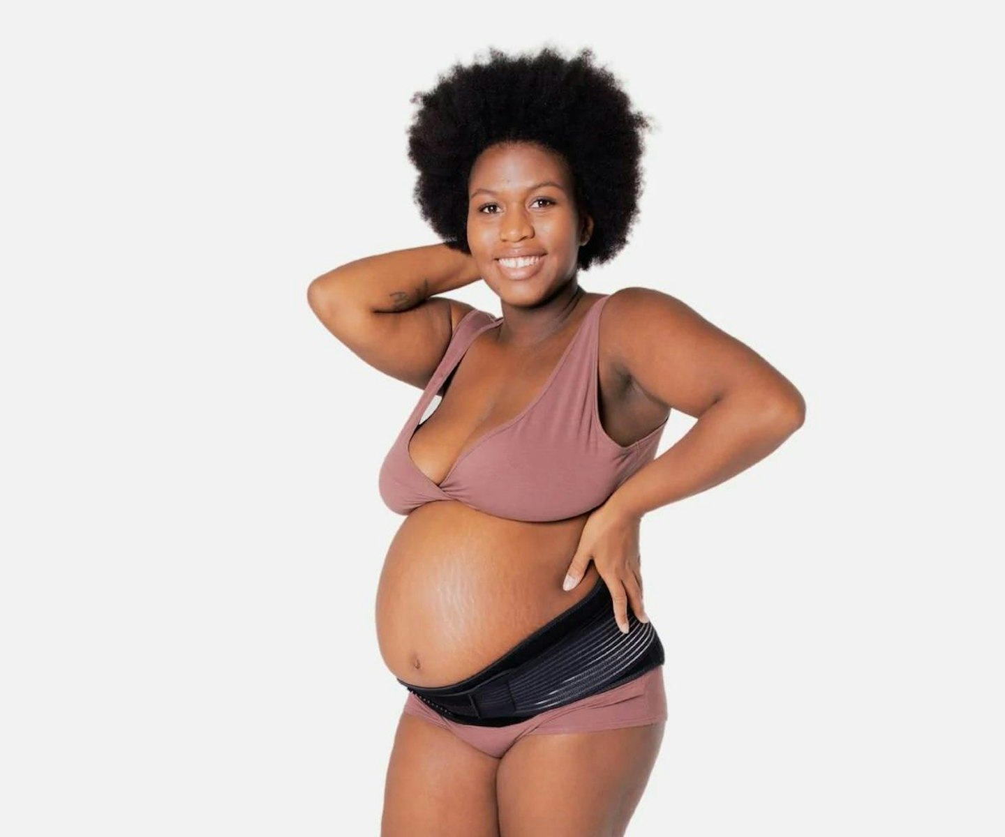 Close Pregnant Woman Underwear Wearing Elastic Pregnancy Bandage
