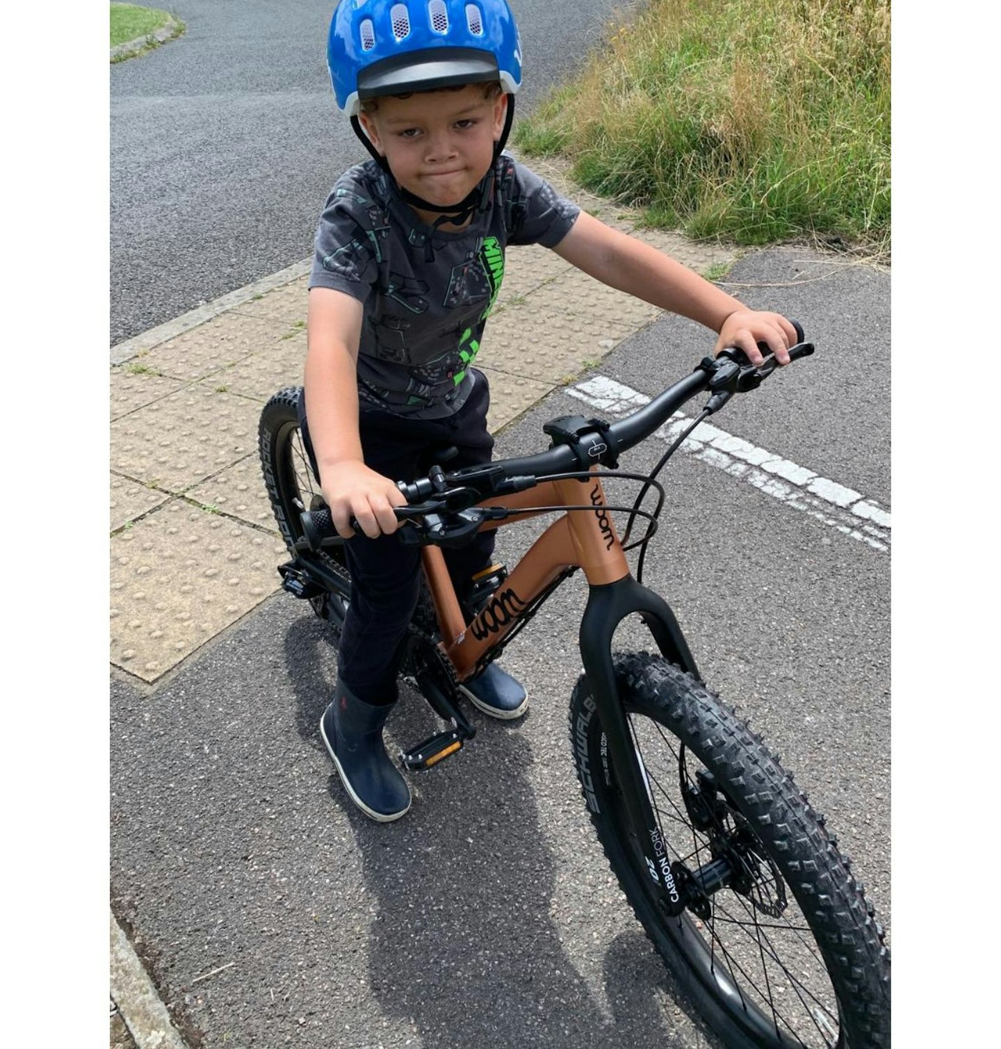 George James at 5 years old riding the woom OFF 4