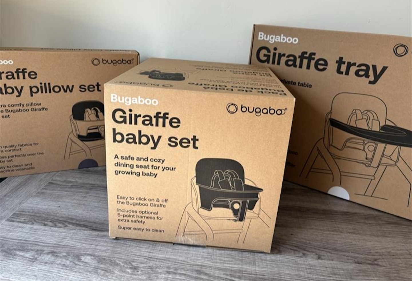 Bugaboo Giraffe high chair accessories in the box and packaging