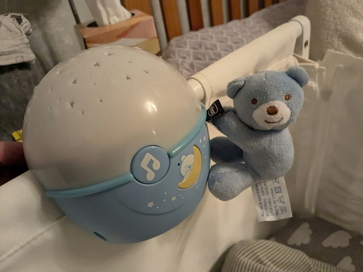 Chicco Next2 Stars Night Light Projector on side of crib
