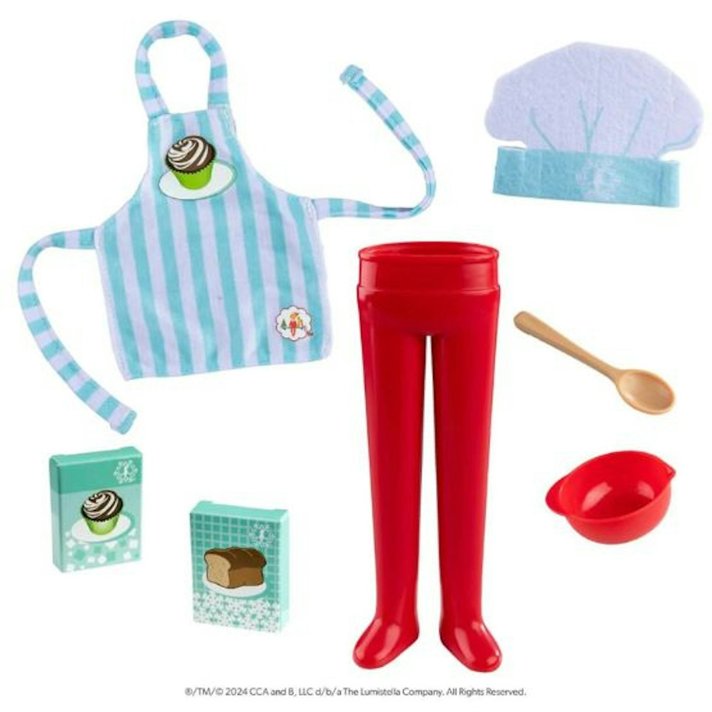 A selection of Elf on the Shelf props for cooking, with an apron, chefs hat, flour, sugar, a bowl, spoon and red trousers