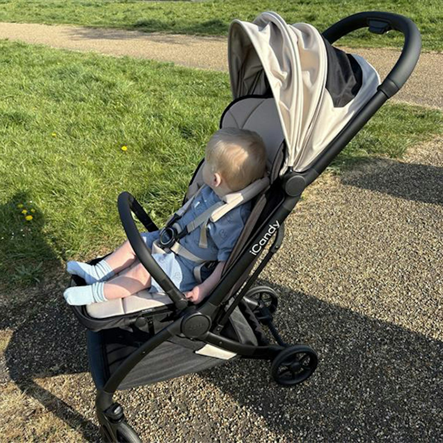 Toddler testing the iCandy Pip in shade Latte