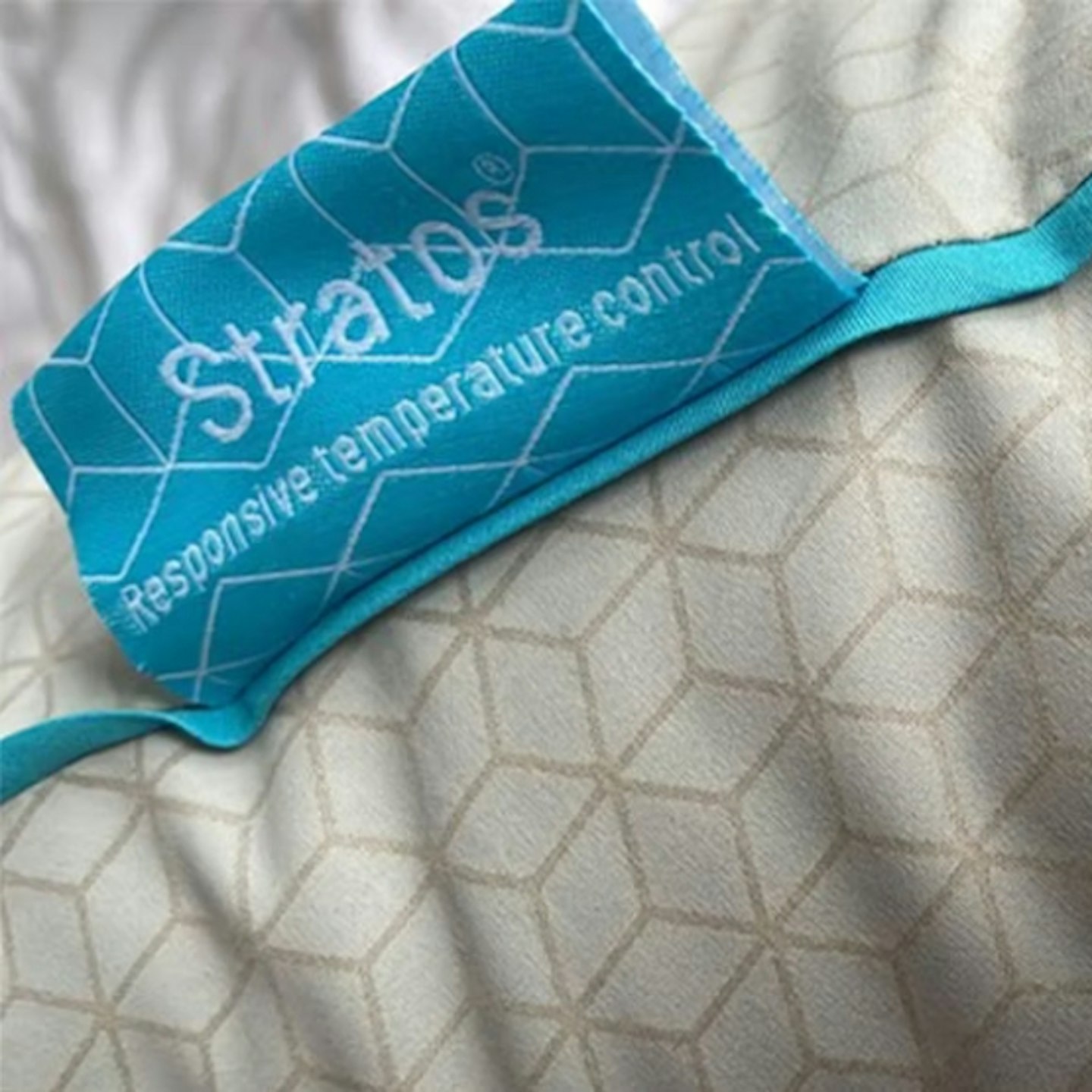 blue logo label on the Simba Cooling Body Pillow