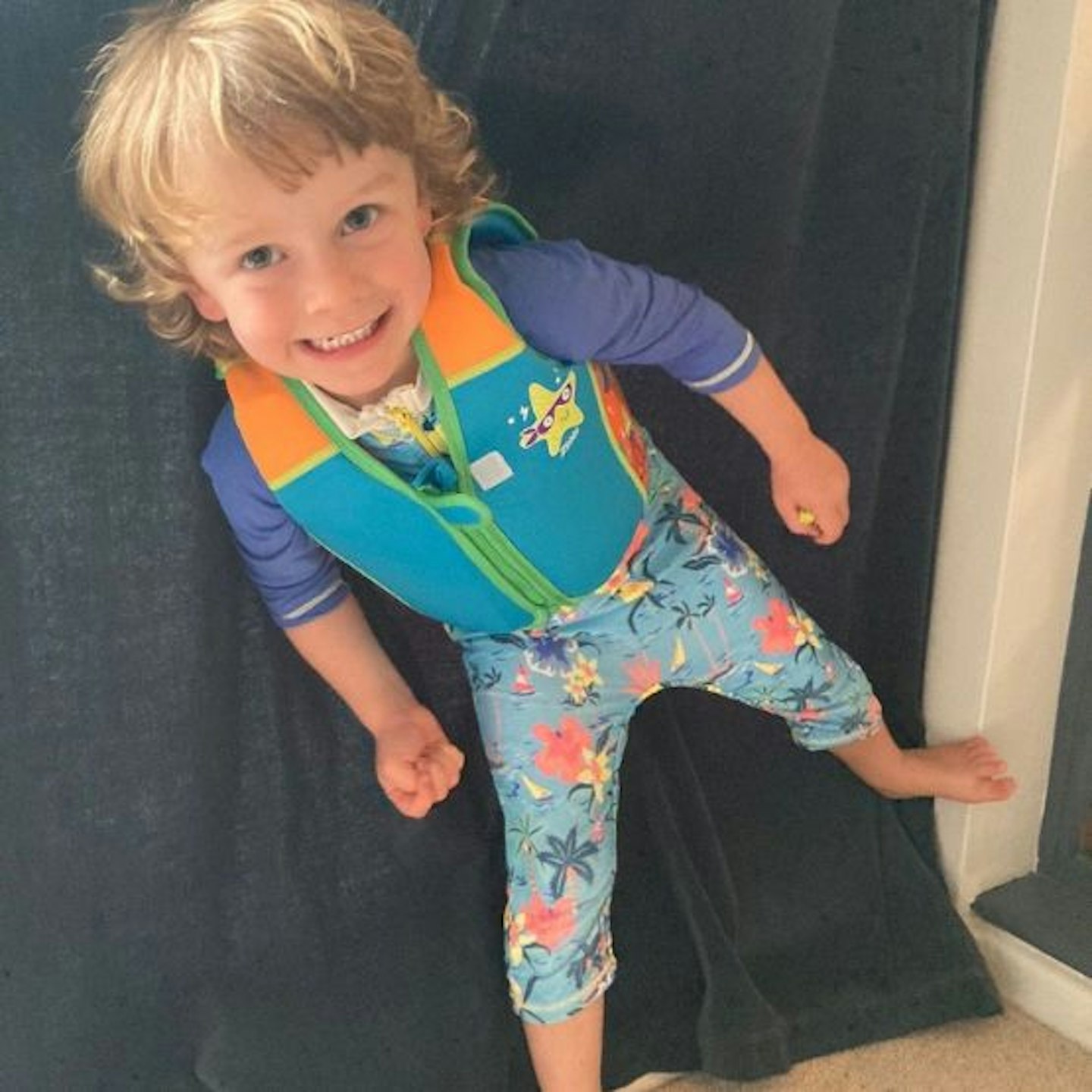 Child testing the Zoggs swim vest