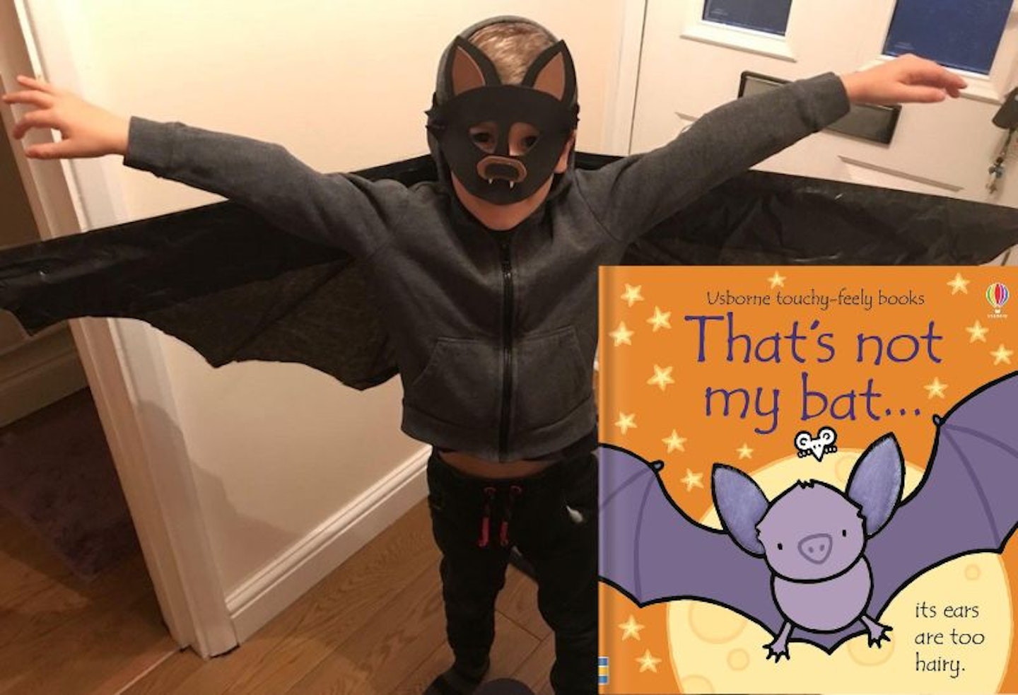 A boy wearing a homemade bat costume with an image of the book 'thats not my bat'