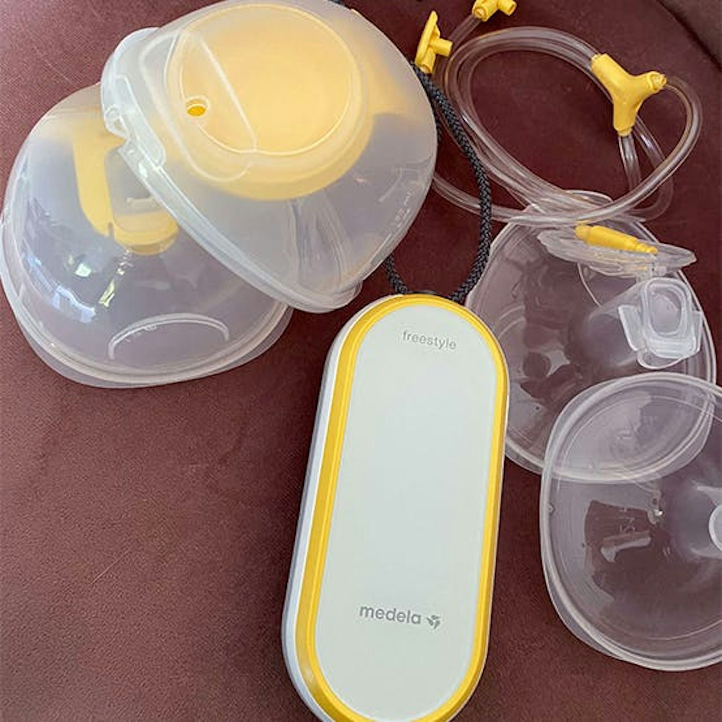 medela-freestyle-double-electric-breast-pump pic on floor