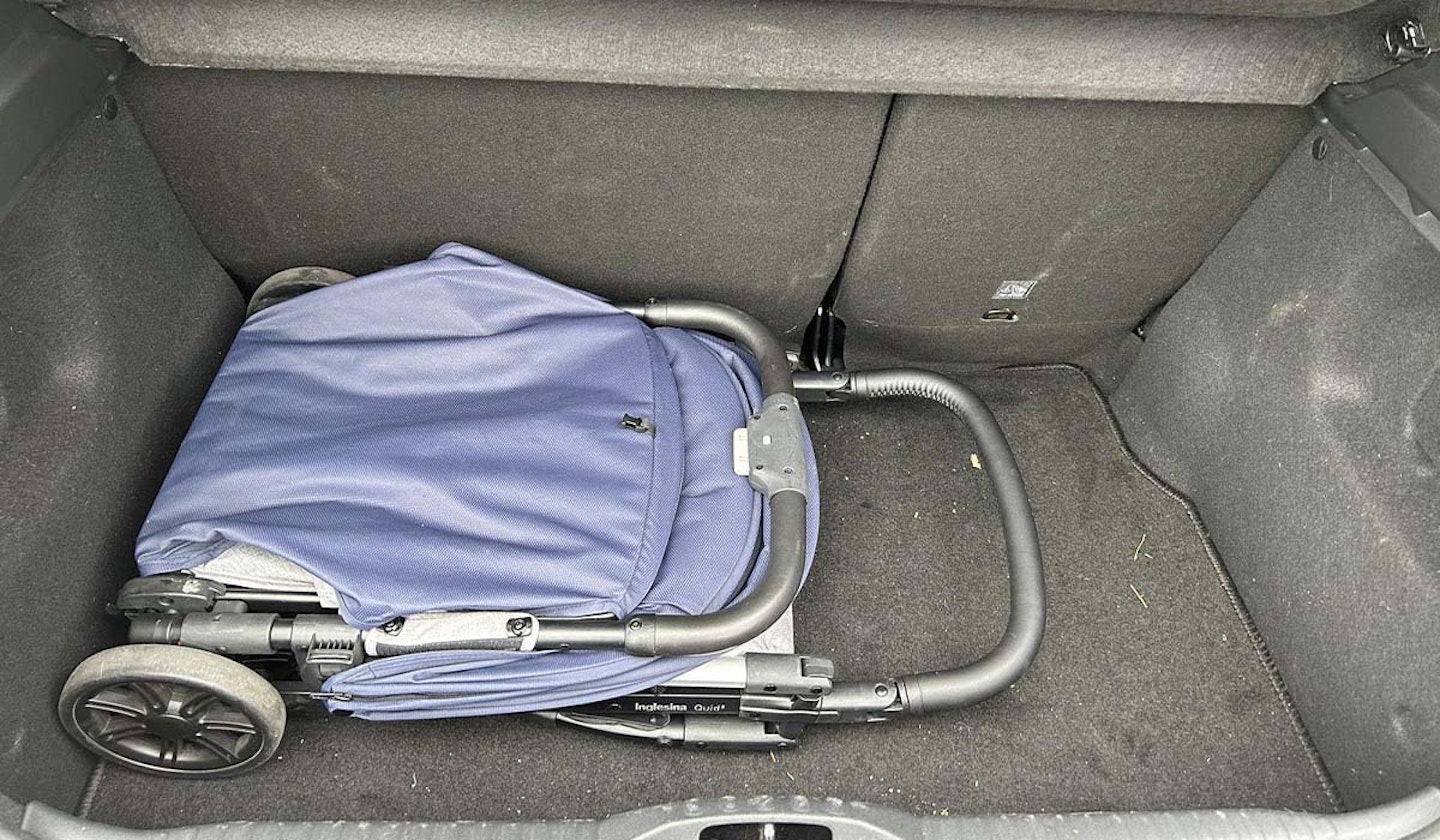 Inglesina Quid² stroller folded in boot