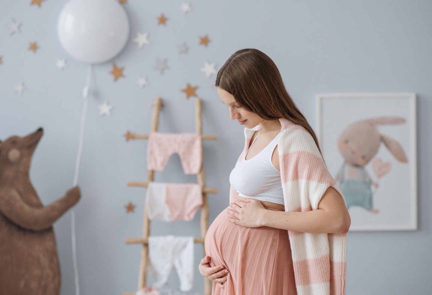 A Pregnant Woman Rubbing Her Belly