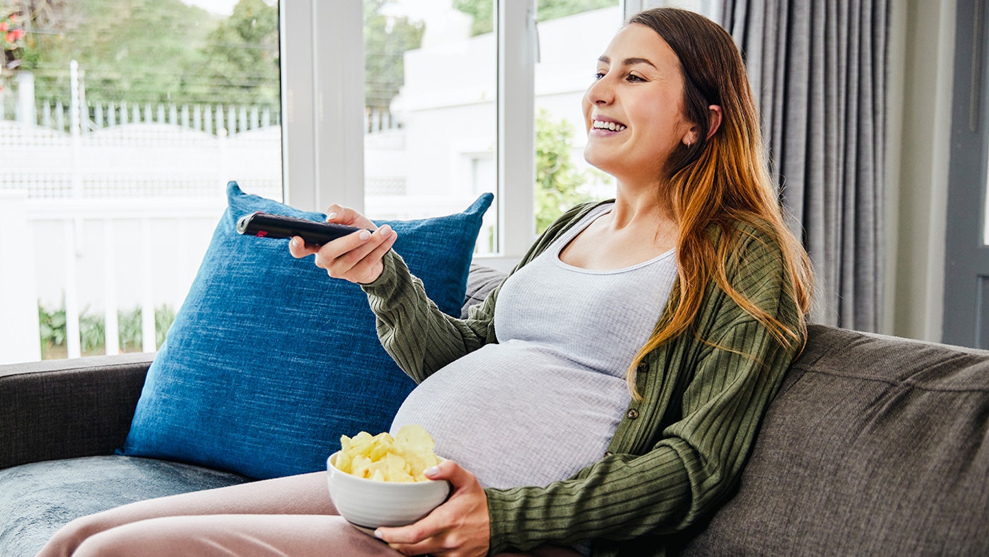 woman eating crisps