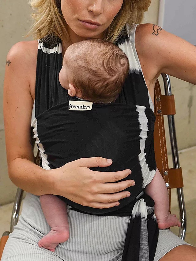 mum carrying baby in a baby carrier