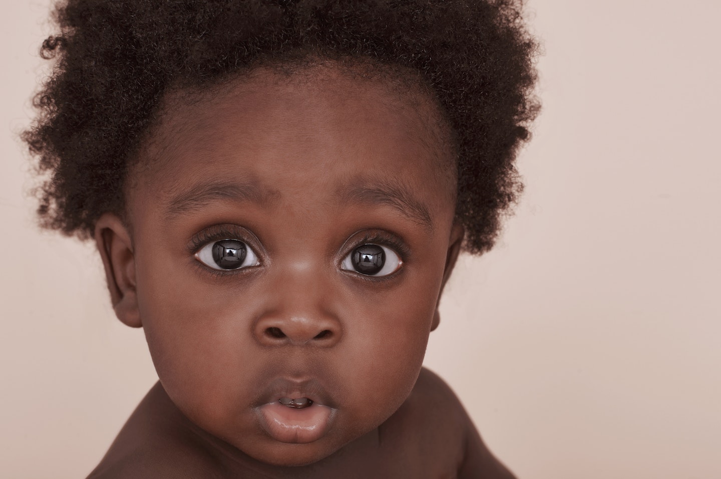 Cute baby with afro