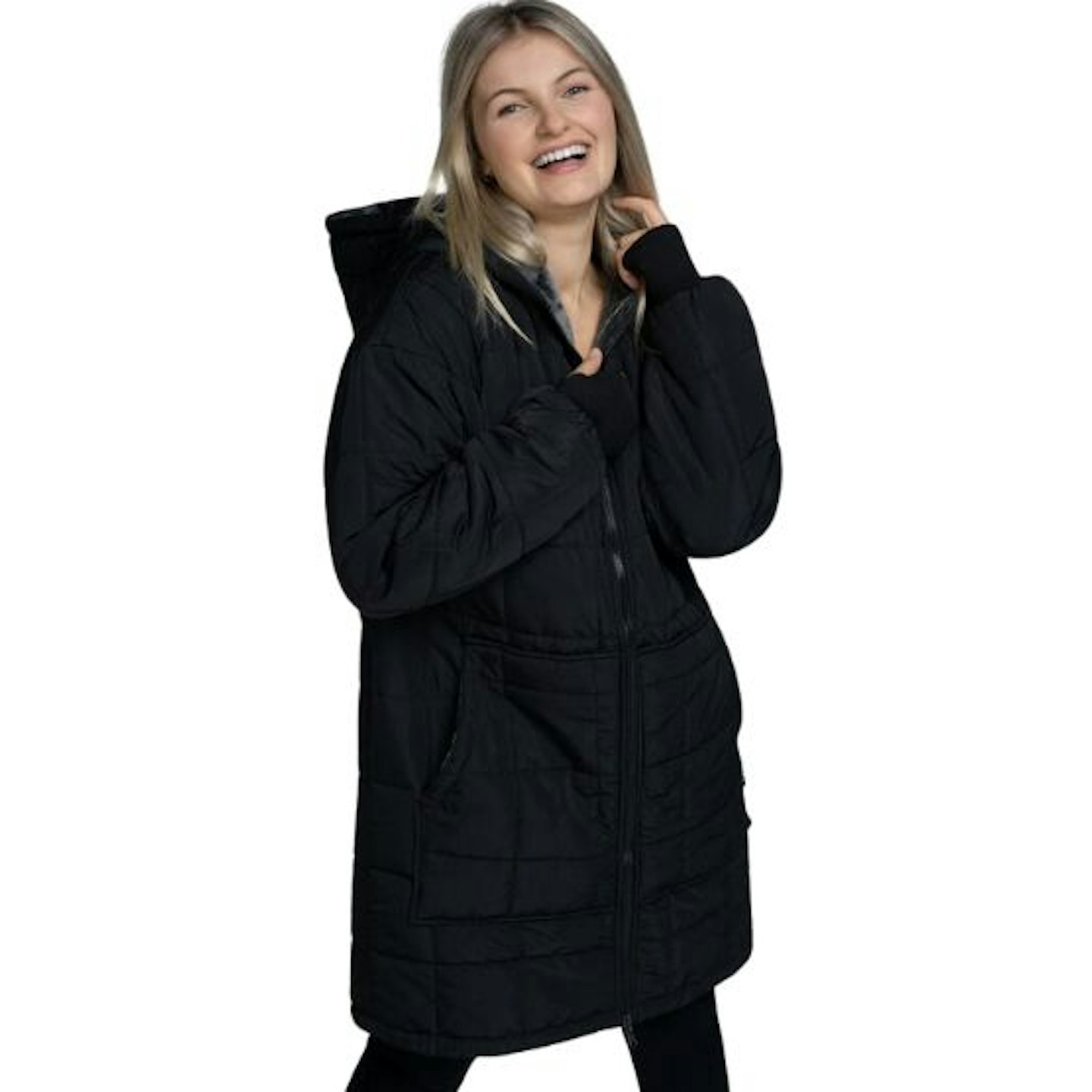 Oodie waterproof coat in charcoal being worn by a blonde woman who's smiling