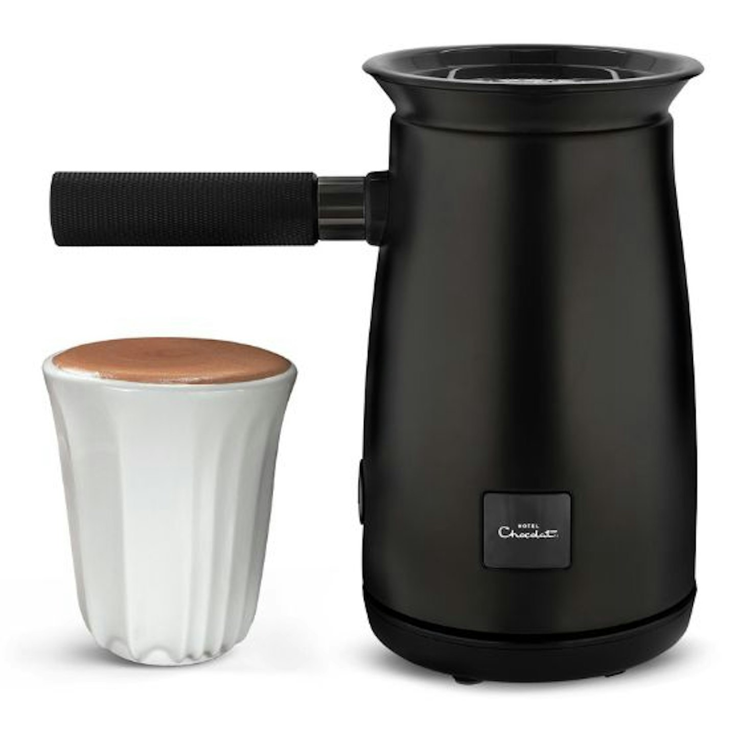 A Hotel Chocolat Velvetiser in Satin Black and a white cup of hot chocolate