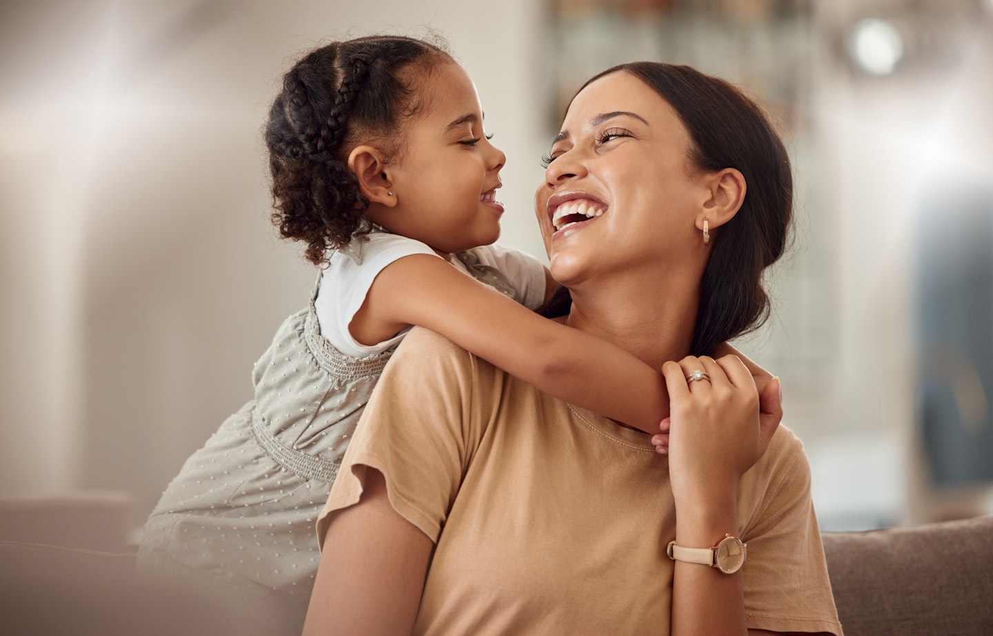 Mum and daughter laughing