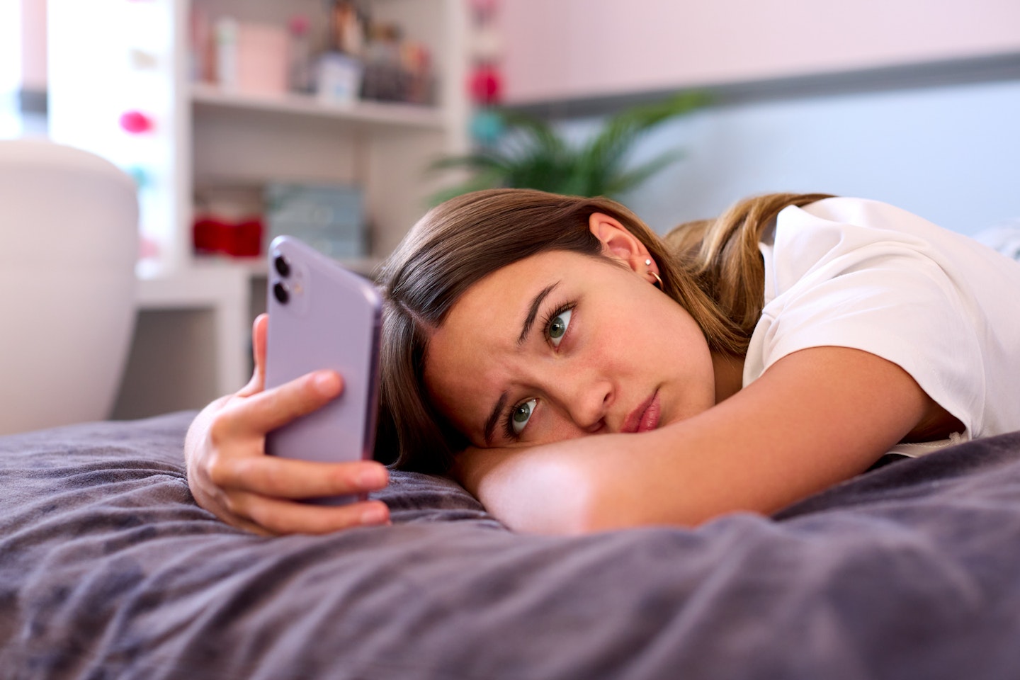 Girl Looking At Mobile Phone