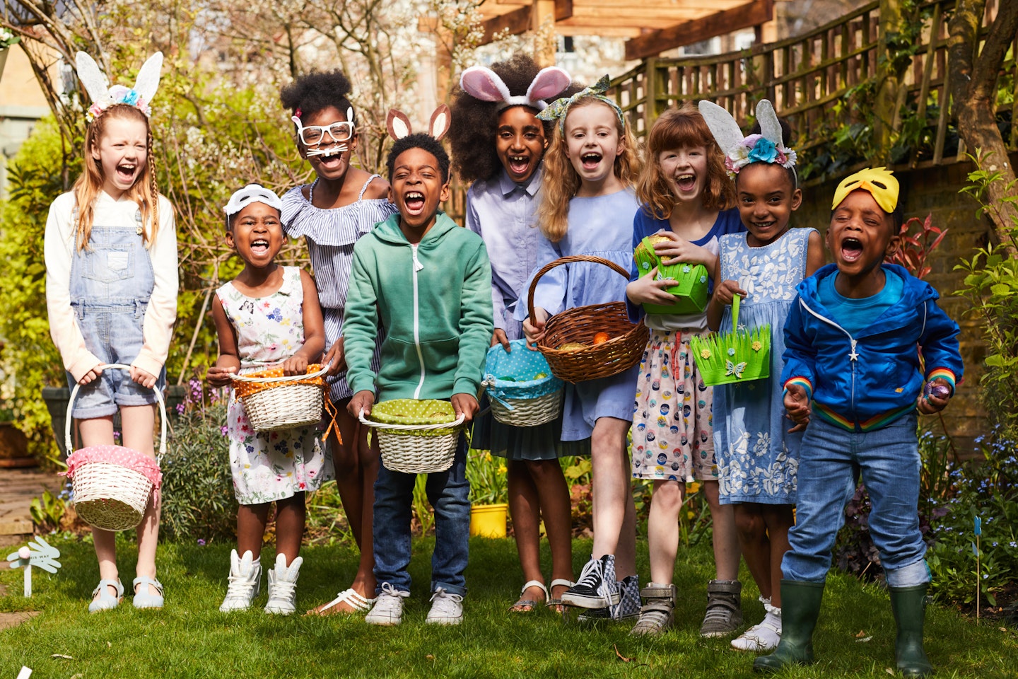 Group of children having fun on an Easter Egg Hunt.