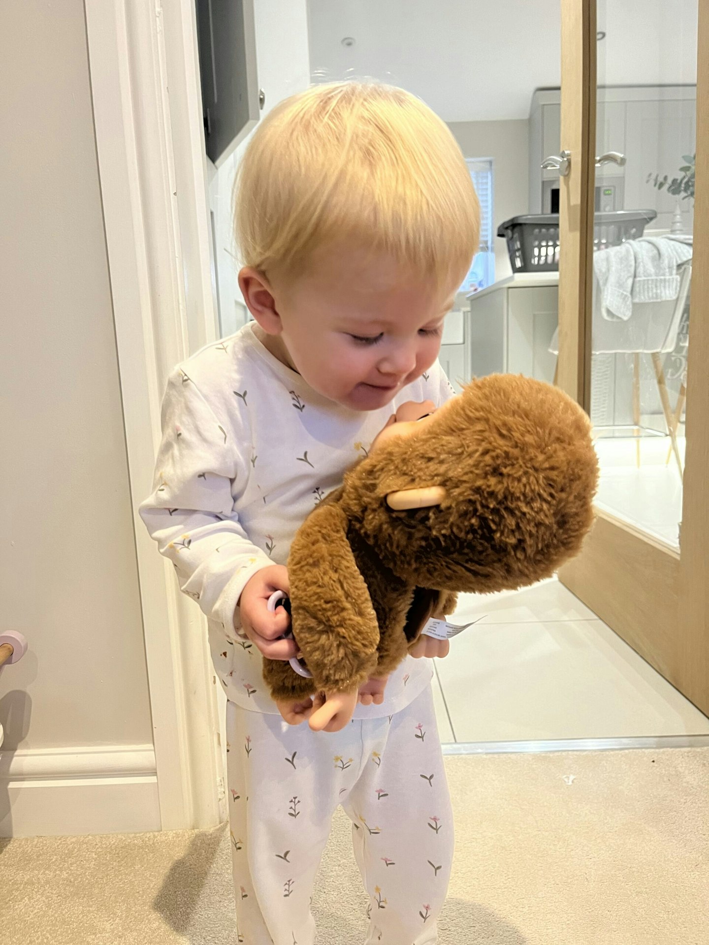 Child playing with Little Live Pets monkey Mango