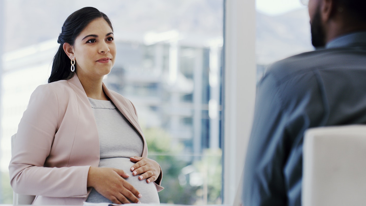 pregnant woman in meeting