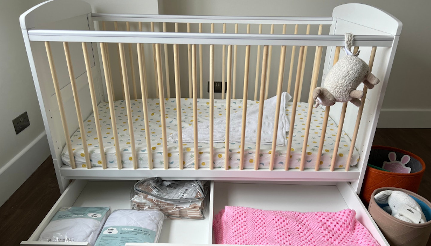 Coleby Scandi cot bed with open drawer